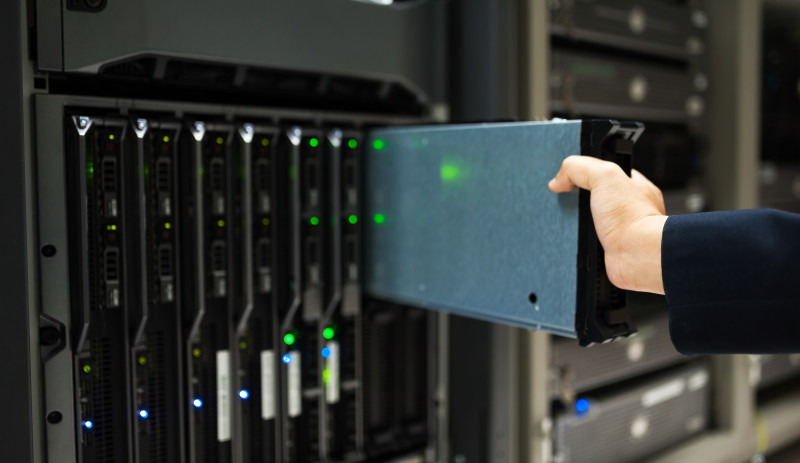 People fix server network in data room .